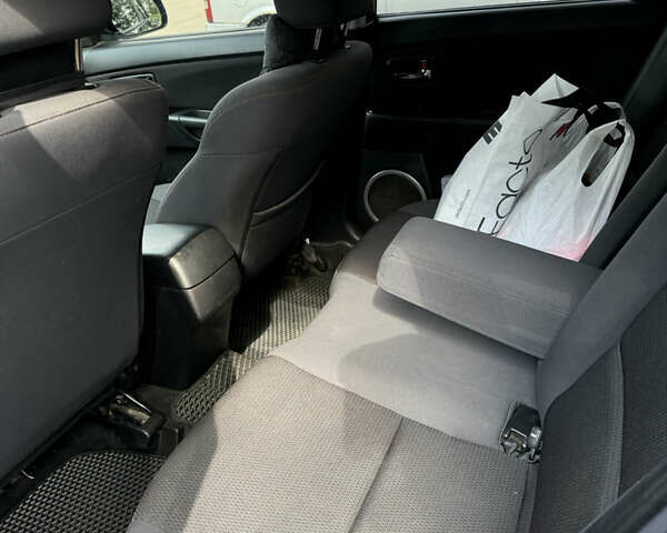 Черный Мазда 3, объемом двигателя 1.6 л и пробегом 211 тыс. км за 5999 $, фото 12 на Automoto.ua