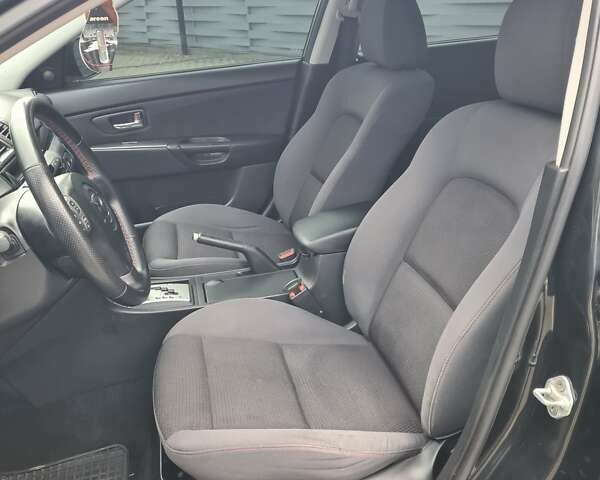 Черный Мазда 3, объемом двигателя 1.6 л и пробегом 182 тыс. км за 5500 $, фото 28 на Automoto.ua