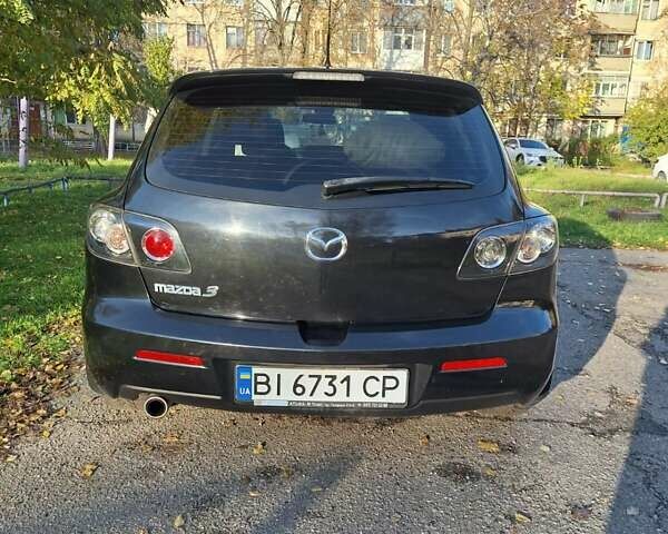 Черный Мазда 3, объемом двигателя 2 л и пробегом 198 тыс. км за 6200 $, фото 21 на Automoto.ua