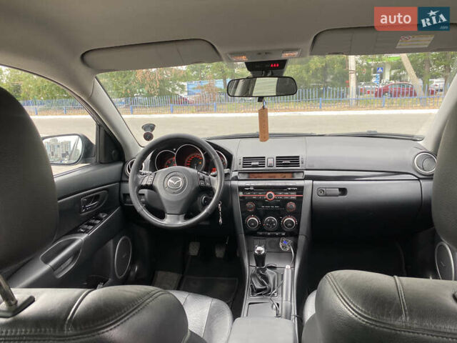 Черный Мазда 3, объемом двигателя 2 л и пробегом 200 тыс. км за 5750 $, фото 16 на Automoto.ua