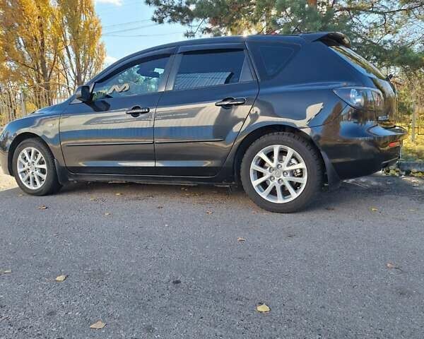 Черный Мазда 3, объемом двигателя 2 л и пробегом 198 тыс. км за 6200 $, фото 16 на Automoto.ua