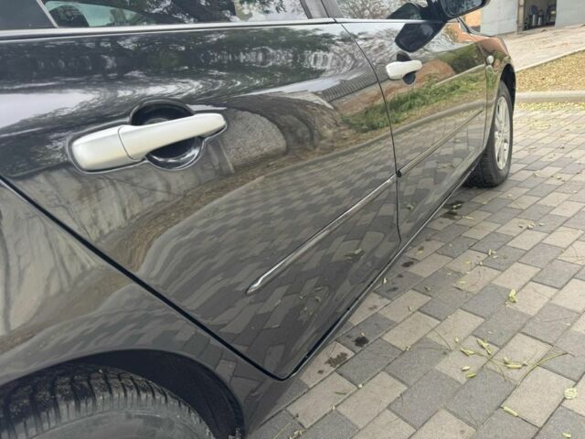 Черный Мазда 3, объемом двигателя 1.6 л и пробегом 215 тыс. км за 5850 $, фото 3 на Automoto.ua