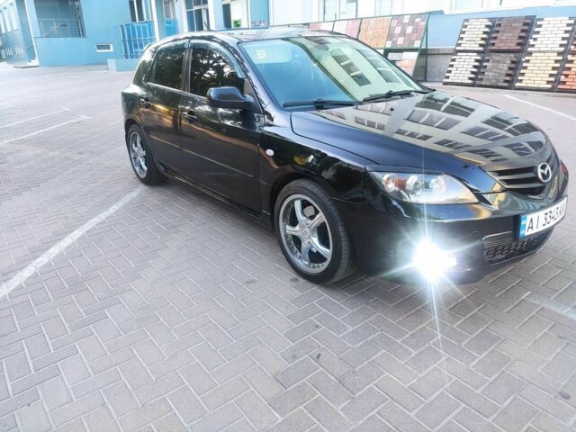 Черный Мазда 3, объемом двигателя 2 л и пробегом 298 тыс. км за 4600 $, фото 2 на Automoto.ua