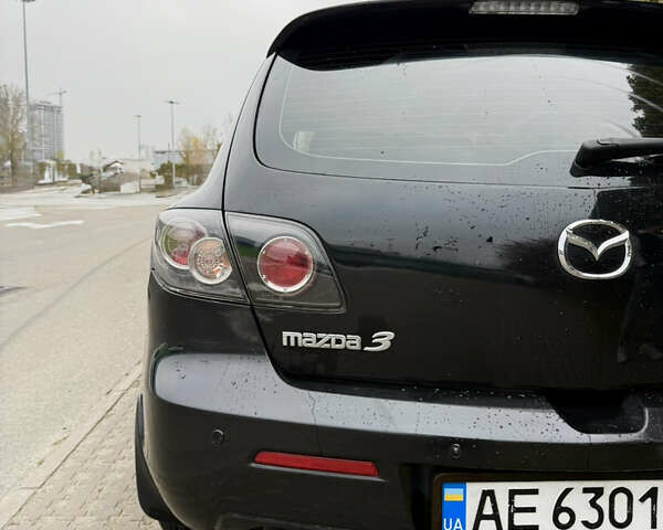 Черный Мазда 3, объемом двигателя 2 л и пробегом 274 тыс. км за 6800 $, фото 11 на Automoto.ua