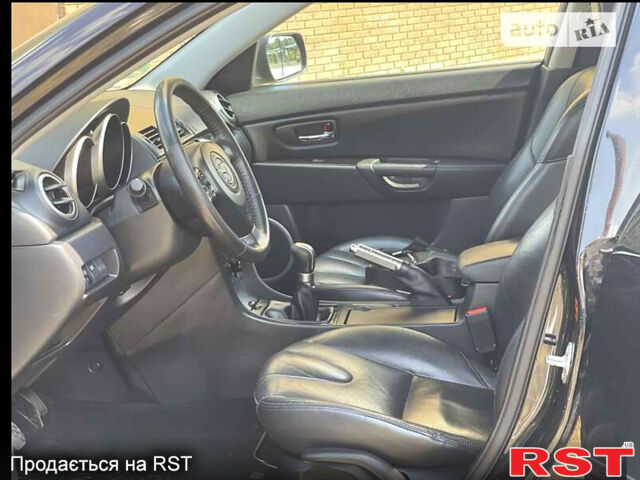 Черный Мазда 3, объемом двигателя 1.6 л и пробегом 203 тыс. км за 6800 $, фото 2 на Automoto.ua