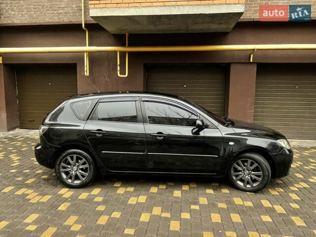 Черный Мазда 3, объемом двигателя 1.6 л и пробегом 210 тыс. км за 5200 $, фото 4 на Automoto.ua