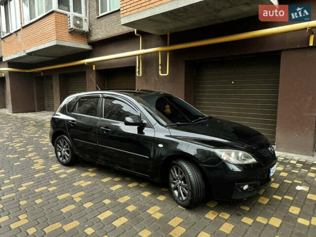 Черный Мазда 3, объемом двигателя 1.6 л и пробегом 210 тыс. км за 5200 $, фото 3 на Automoto.ua