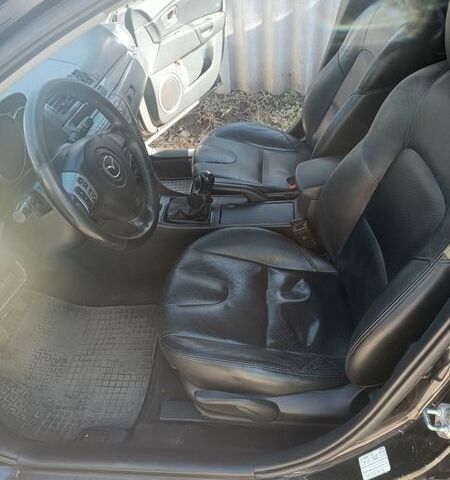 Черный Мазда 3, объемом двигателя 2 л и пробегом 163 тыс. км за 4000 $, фото 7 на Automoto.ua