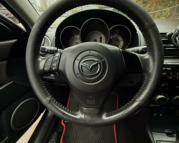 Черный Мазда 3, объемом двигателя 2 л и пробегом 274 тыс. км за 6800 $, фото 20 на Automoto.ua