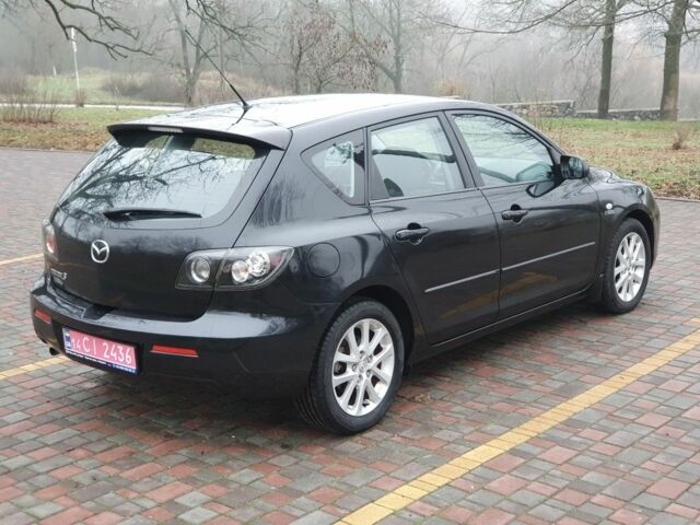 Чорний Мазда 3, об'ємом двигуна 1.6 л та пробігом 264 тис. км за 5700 $, фото 4 на Automoto.ua