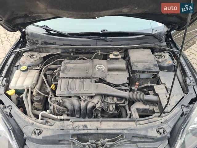Черный Мазда 3, объемом двигателя 1.6 л и пробегом 182 тыс. км за 5500 $, фото 33 на Automoto.ua