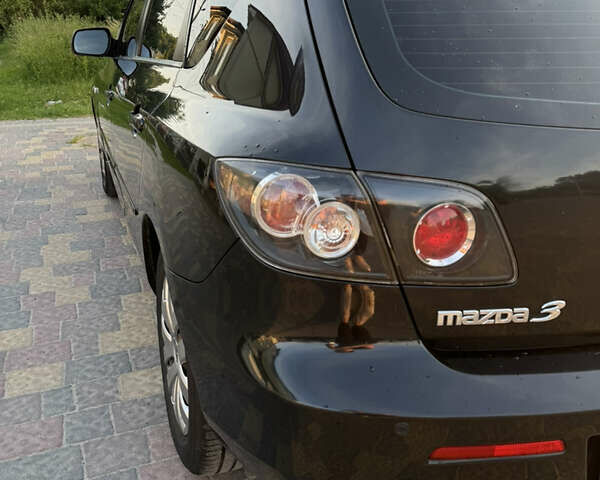 Черный Мазда 3, объемом двигателя 1.6 л и пробегом 240 тыс. км за 6200 $, фото 6 на Automoto.ua