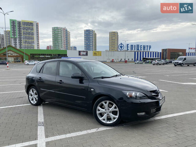 Черный Мазда 3, объемом двигателя 2 л и пробегом 200 тыс. км за 5750 $, фото 1 на Automoto.ua