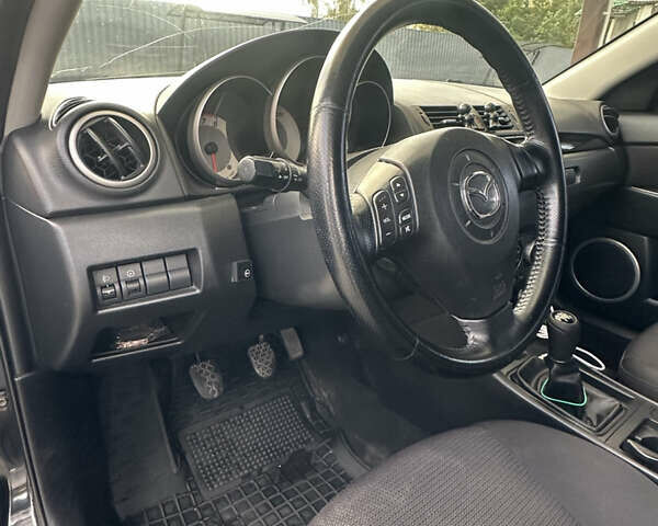 Чорний Мазда 3, об'ємом двигуна 1.6 л та пробігом 215 тис. км за 5500 $, фото 10 на Automoto.ua