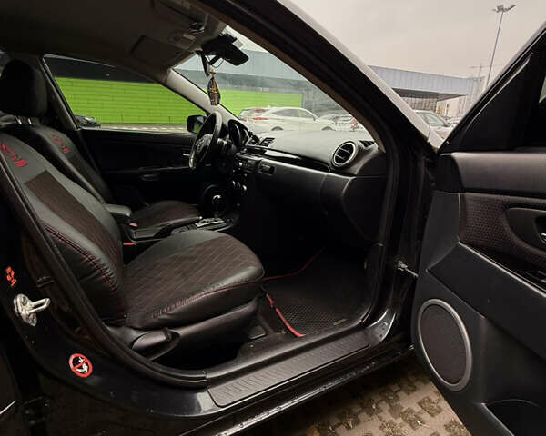 Черный Мазда 3, объемом двигателя 2 л и пробегом 274 тыс. км за 6800 $, фото 26 на Automoto.ua