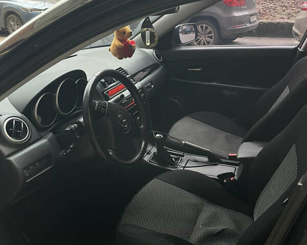 Черный Мазда 3, объемом двигателя 1.6 л и пробегом 210 тыс. км за 5200 $, фото 9 на Automoto.ua