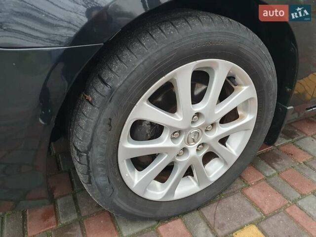 Черный Мазда 3, объемом двигателя 1.6 л и пробегом 264 тыс. км за 5900 $, фото 28 на Automoto.ua