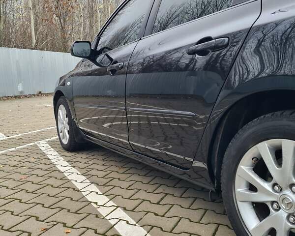Черный Мазда 3, объемом двигателя 1.6 л и пробегом 182 тыс. км за 5500 $, фото 13 на Automoto.ua