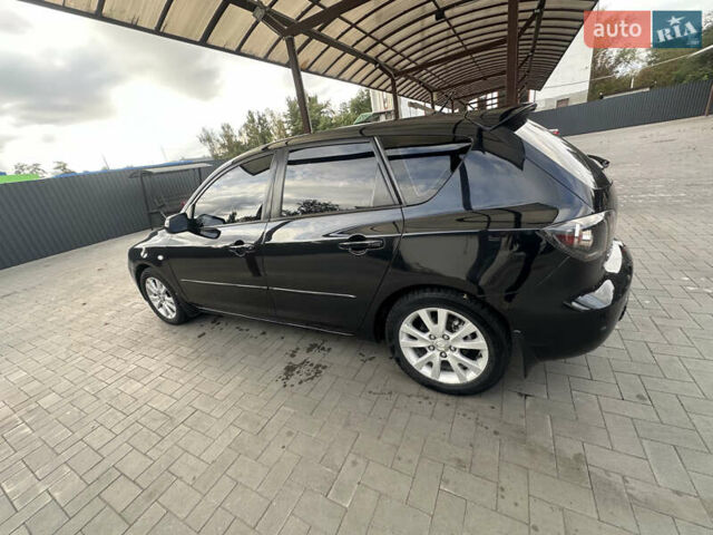 Чорний Мазда 3, об'ємом двигуна 1.6 л та пробігом 215 тис. км за 5500 $, фото 7 на Automoto.ua