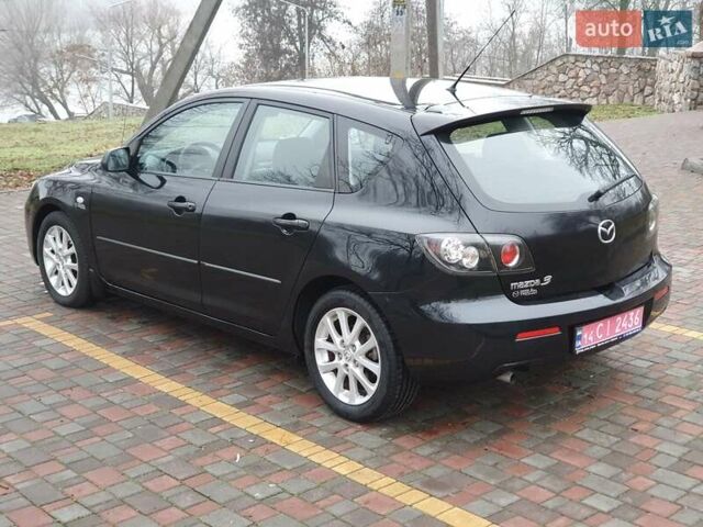 Черный Мазда 3, объемом двигателя 1.6 л и пробегом 264 тыс. км за 5700 $, фото 6 на Automoto.ua