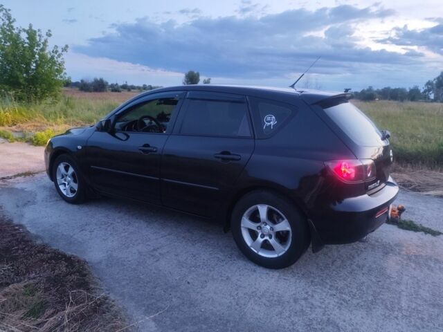 Чорний Мазда 3, об'ємом двигуна 2 л та пробігом 154 тис. км за 5319 $, фото 2 на Automoto.ua