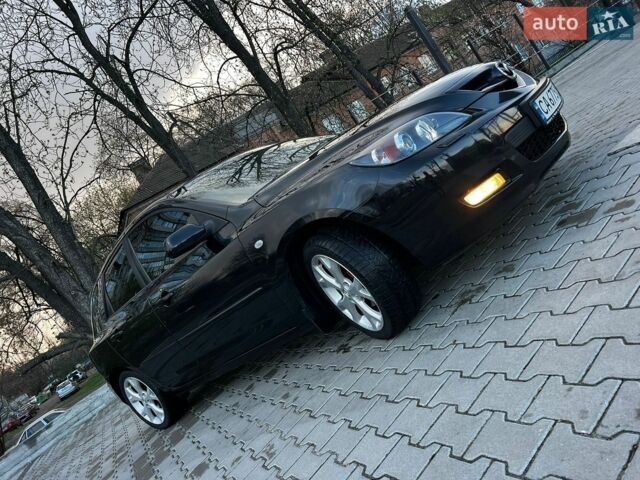 Черный Мазда 3, объемом двигателя 1.6 л и пробегом 250 тыс. км за 5850 $, фото 18 на Automoto.ua