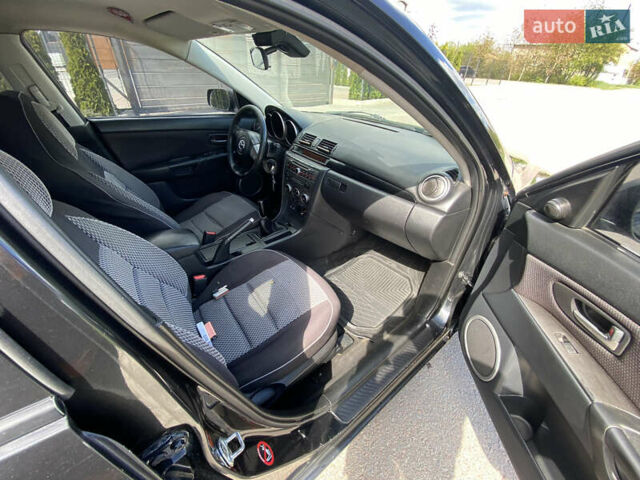 Черный Мазда 3, объемом двигателя 1.6 л и пробегом 260 тыс. км за 5300 $, фото 11 на Automoto.ua