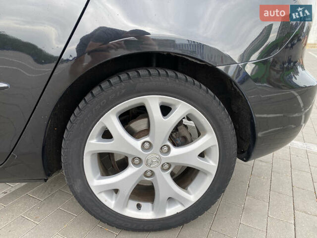 Черный Мазда 3, объемом двигателя 2 л и пробегом 200 тыс. км за 5750 $, фото 21 на Automoto.ua