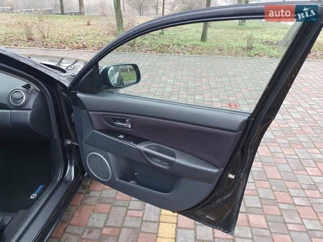 Черный Мазда 3, объемом двигателя 1.6 л и пробегом 264 тыс. км за 5700 $, фото 19 на Automoto.ua