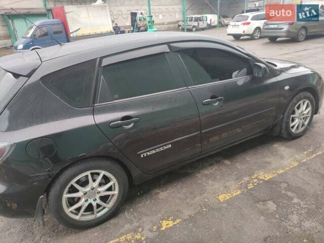 Чорний Мазда 3, об'ємом двигуна 2 л та пробігом 226 тис. км за 5700 $, фото 3 на Automoto.ua
