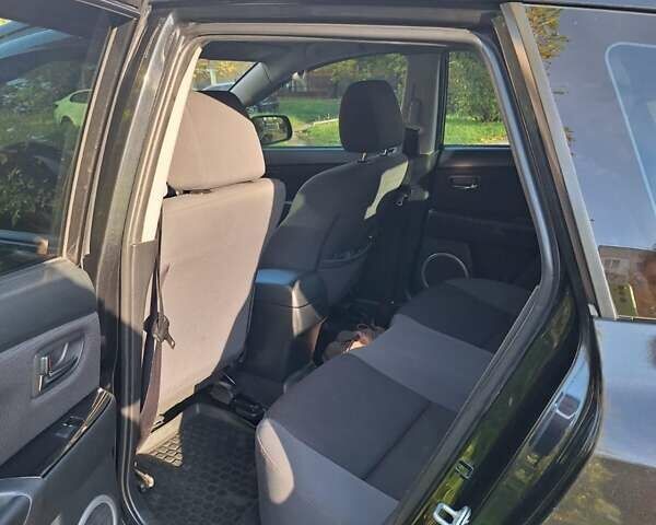 Черный Мазда 3, объемом двигателя 2 л и пробегом 198 тыс. км за 6200 $, фото 9 на Automoto.ua