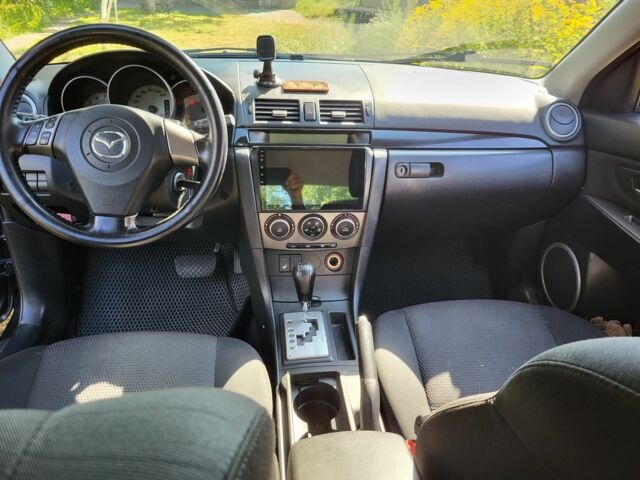 Черный Мазда 3, объемом двигателя 1.6 л и пробегом 325 тыс. км за 4600 $, фото 6 на Automoto.ua