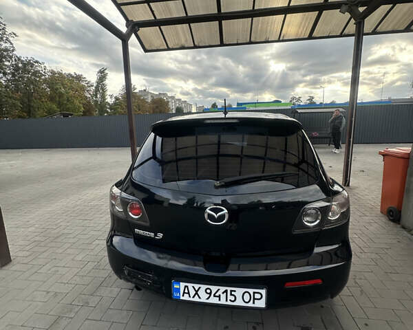 Чорний Мазда 3, об'ємом двигуна 1.6 л та пробігом 215 тис. км за 5500 $, фото 5 на Automoto.ua