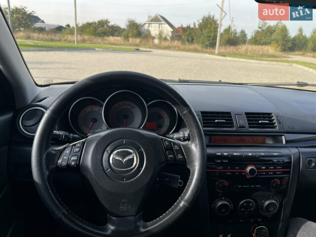 Черный Мазда 3, объемом двигателя 2 л и пробегом 288 тыс. км за 5100 $, фото 7 на Automoto.ua