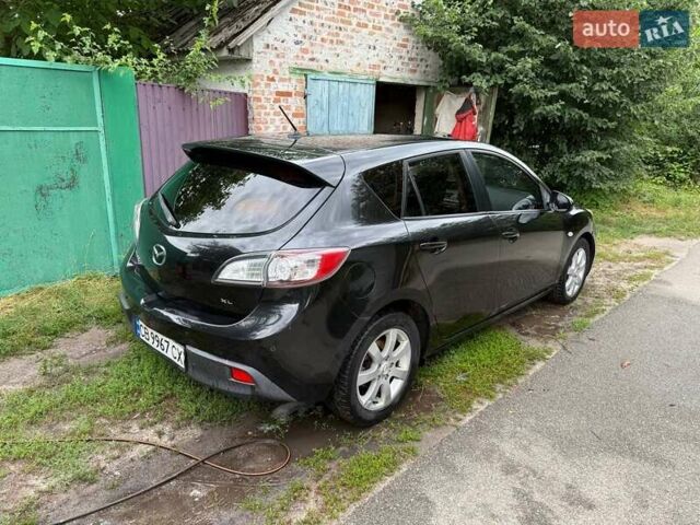 Чорний Мазда 3, об'ємом двигуна 1.6 л та пробігом 244 тис. км за 6500 $, фото 7 на Automoto.ua