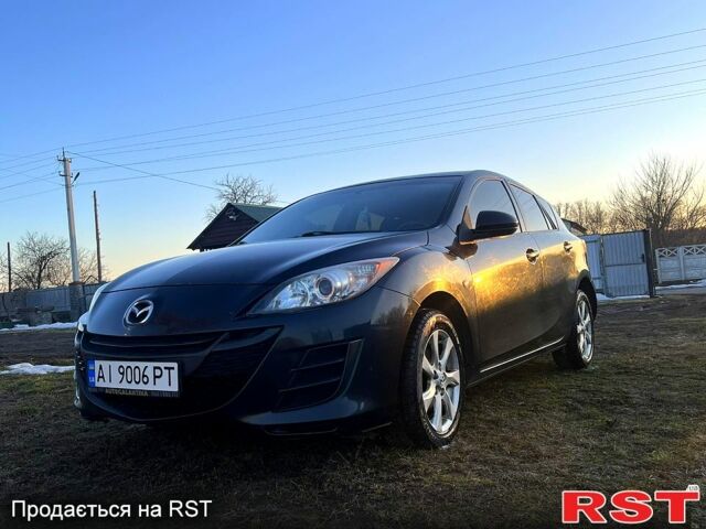 Черный Мазда 3, объемом двигателя 1.6 л и пробегом 230 тыс. км за 5200 $, фото 7 на Automoto.ua