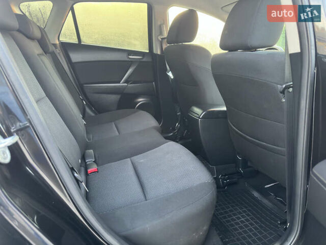 Черный Мазда 3, объемом двигателя 1.6 л и пробегом 127 тыс. км за 7500 $, фото 33 на Automoto.ua