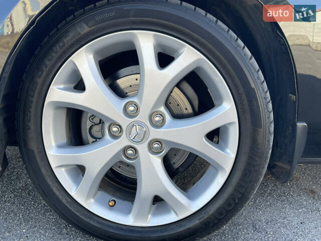 Черный Мазда 3, объемом двигателя 1.6 л и пробегом 107 тыс. км за 7400 $, фото 22 на Automoto.ua