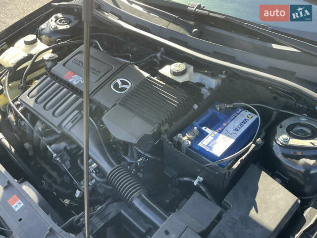 Черный Мазда 3, объемом двигателя 1.6 л и пробегом 107 тыс. км за 7400 $, фото 58 на Automoto.ua