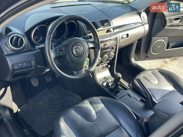 Черный Мазда 3, объемом двигателя 1.6 л и пробегом 107 тыс. км за 7400 $, фото 28 на Automoto.ua