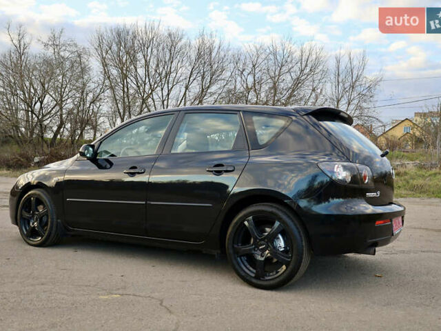 Черный Мазда 3, объемом двигателя 1.6 л и пробегом 183 тыс. км за 7499 $, фото 7 на Automoto.ua