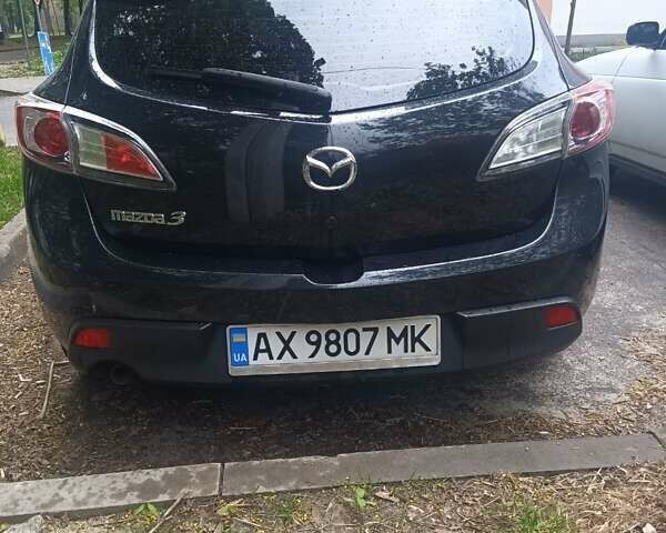 Черный Мазда 3, объемом двигателя 1.6 л и пробегом 126 тыс. км за 7500 $, фото 6 на Automoto.ua