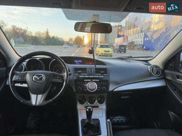 Черный Мазда 3, объемом двигателя 1.6 л и пробегом 127 тыс. км за 7500 $, фото 45 на Automoto.ua