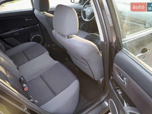 Черный Мазда 3, объемом двигателя 1.6 л и пробегом 183 тыс. км за 7499 $, фото 24 на Automoto.ua