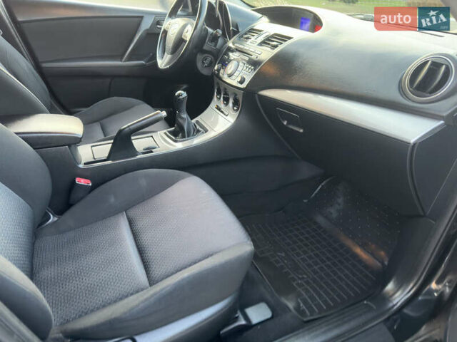 Черный Мазда 3, объемом двигателя 1.6 л и пробегом 127 тыс. км за 7500 $, фото 28 на Automoto.ua