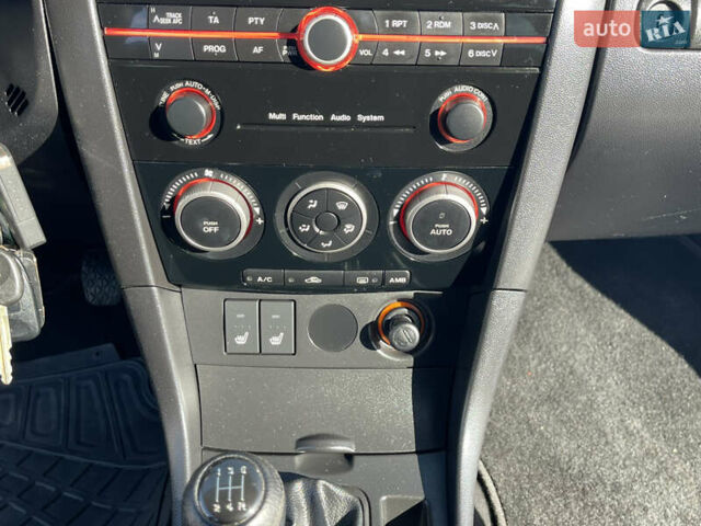 Черный Мазда 3, объемом двигателя 1.6 л и пробегом 107 тыс. км за 7400 $, фото 49 на Automoto.ua