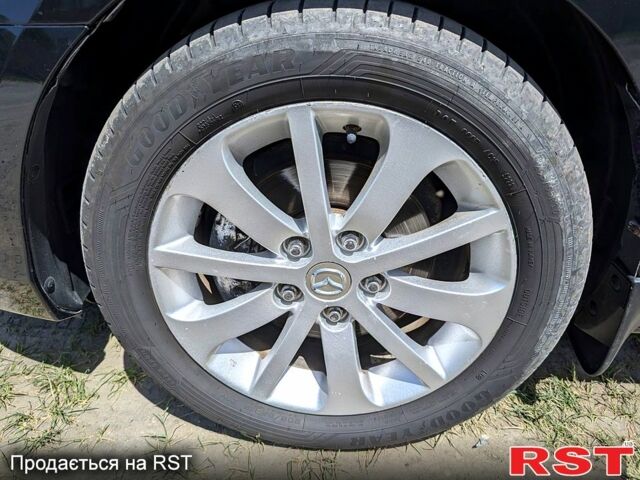 Черный Мазда 3, объемом двигателя 1.6 л и пробегом 217 тыс. км за 4800 $, фото 2 на Automoto.ua