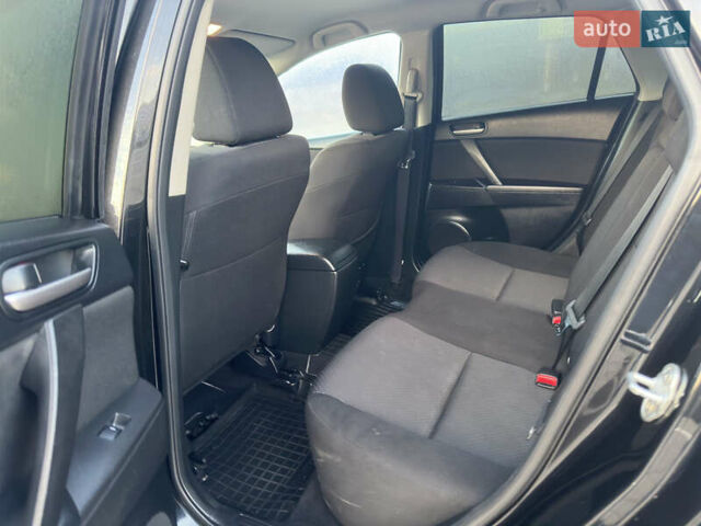 Черный Мазда 3, объемом двигателя 1.6 л и пробегом 127 тыс. км за 7500 $, фото 38 на Automoto.ua