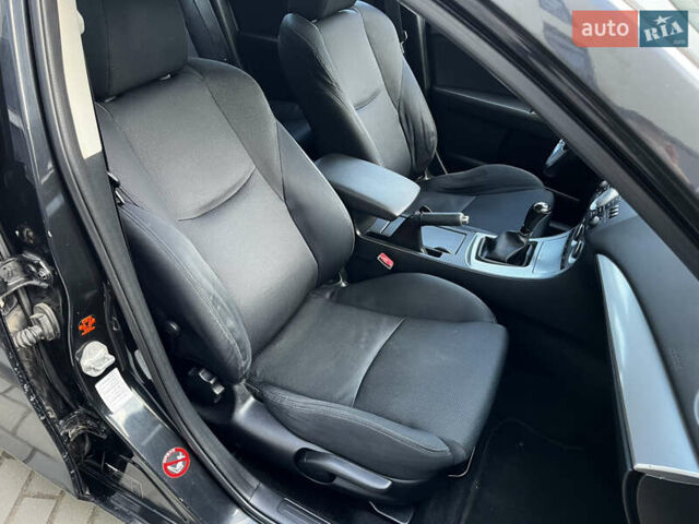 Черный Мазда 3, объемом двигателя 1.6 л и пробегом 235 тыс. км за 5799 $, фото 21 на Automoto.ua