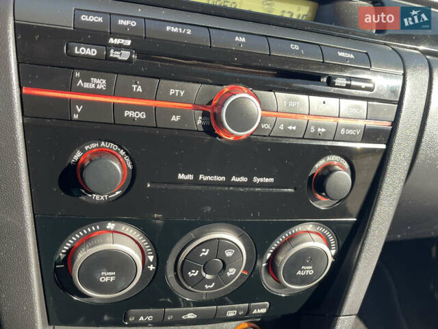 Черный Мазда 3, объемом двигателя 1.6 л и пробегом 107 тыс. км за 7400 $, фото 52 на Automoto.ua